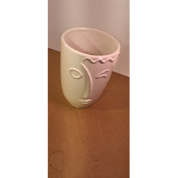 Urtepotteskjuler med ansigt