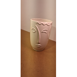 Urtepotteskjuler med ansigt